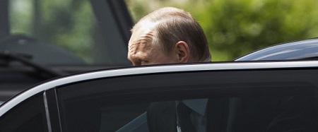 Russian President Vladimir Putin gets off a car as he arrives to take part in a wreath laying ceremony at the Tomb of the Unknown Soldier outside Moscow's Kremlin Wall, in Moscow, Russia, Monday, June 22, 2015, to mark the 74th anniversary of the Nazi invasion of the Soviet Union. (AP Photo/Alexander Zemlianichenko)